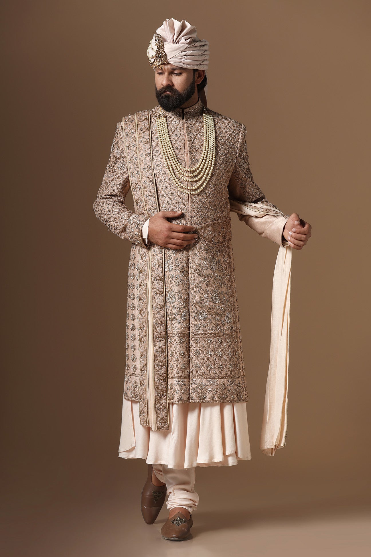 Experience our best sherwani, adorned with captivating floral and geometric embroidery. Shop Now!