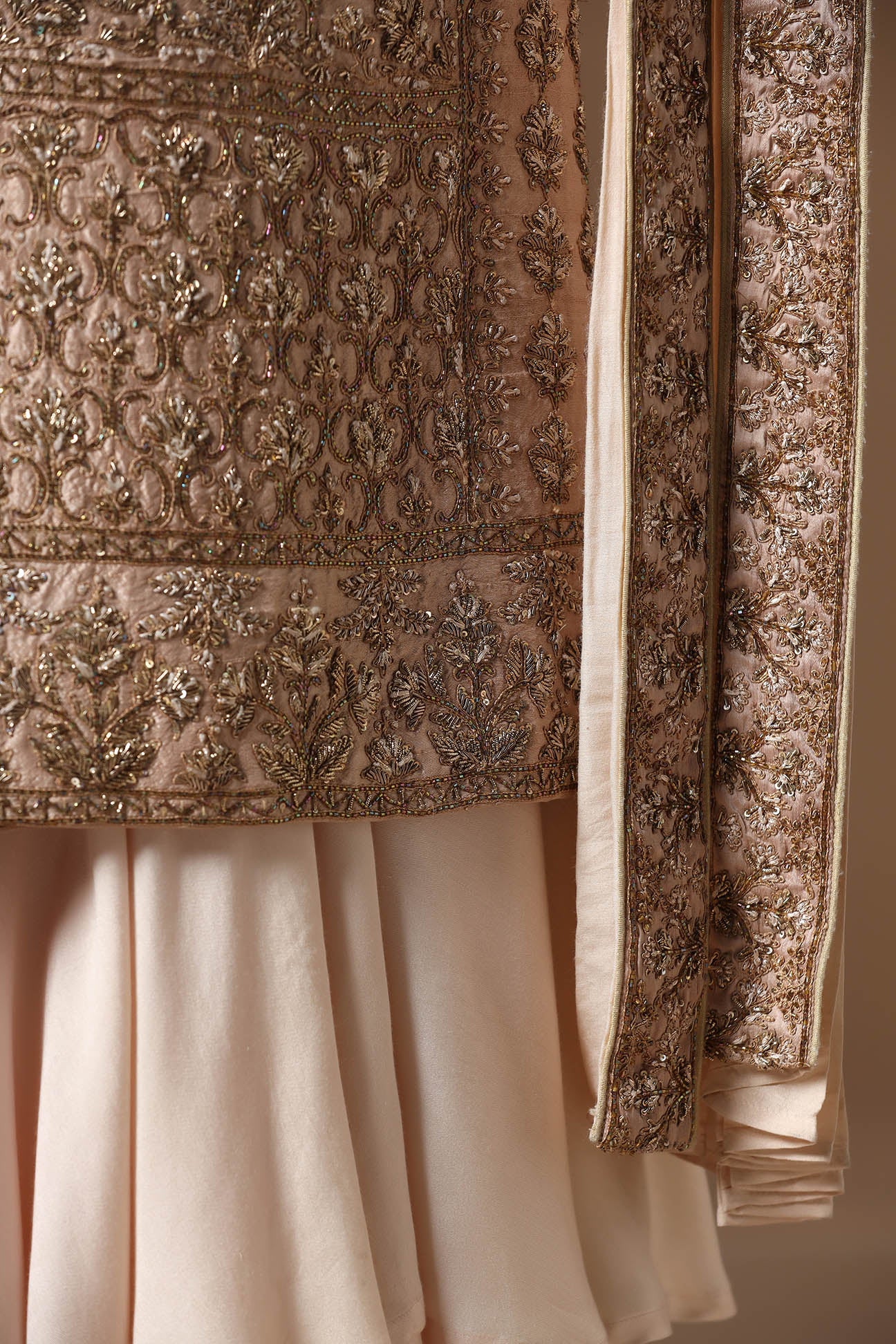 Experience our best sherwani, adorned with captivating floral and geometric embroidery. Shop Now!