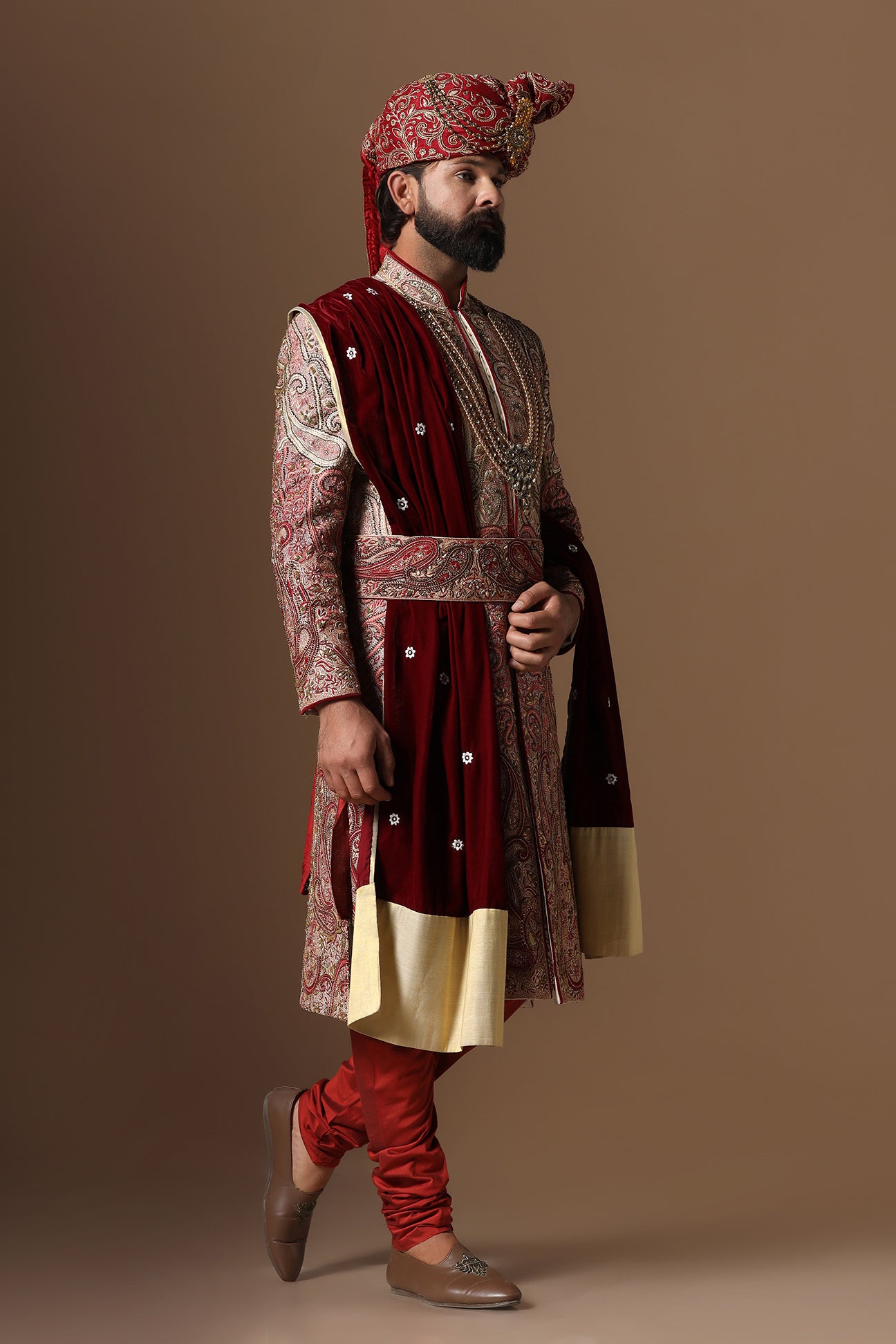 Elevate your style with our ombre embroidered Sherwani, merging Beige and Maroon tones. Shop Now!
