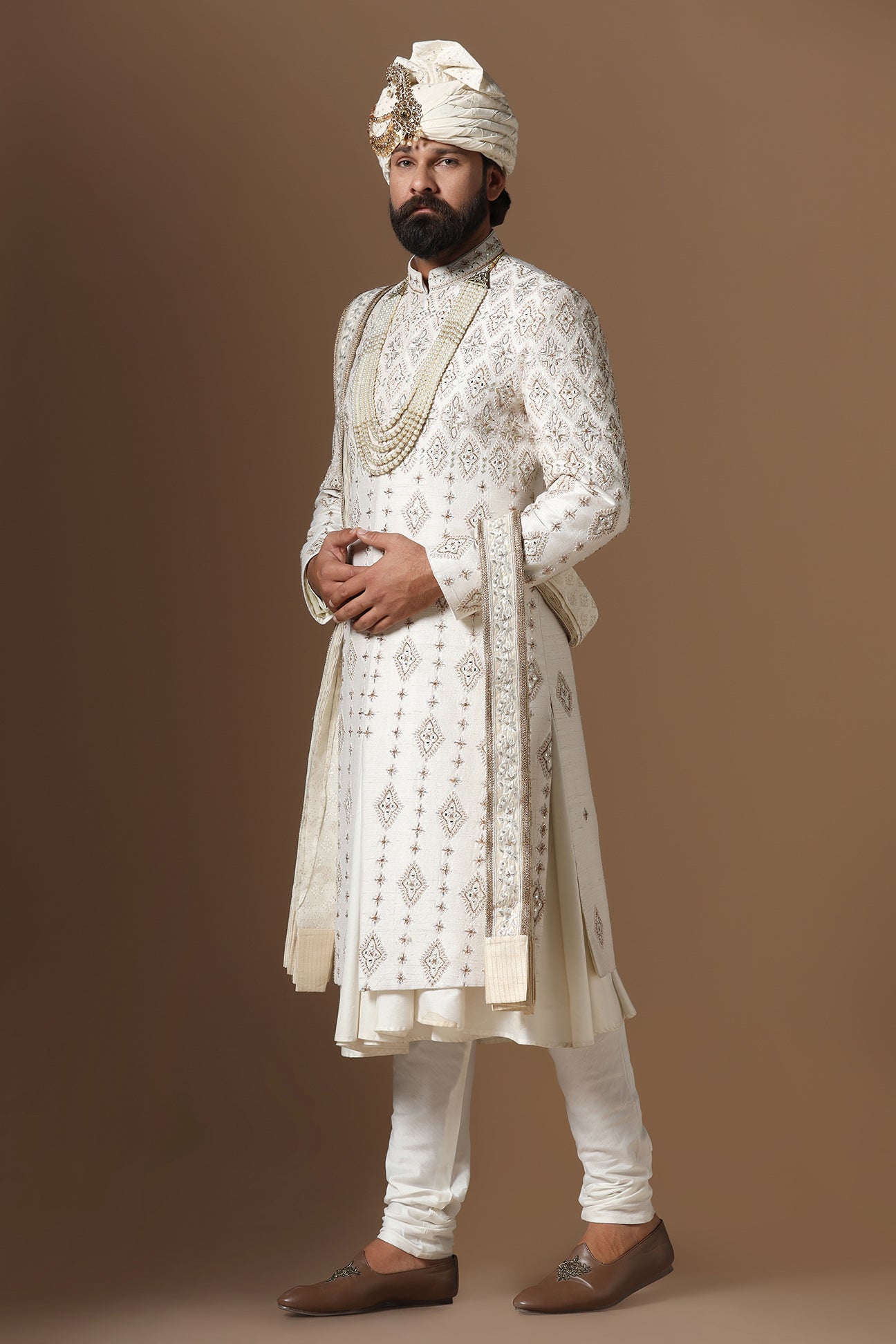 Elevate your style with this elegant Off- white Raw-Silk Sherwani. Shop Now!