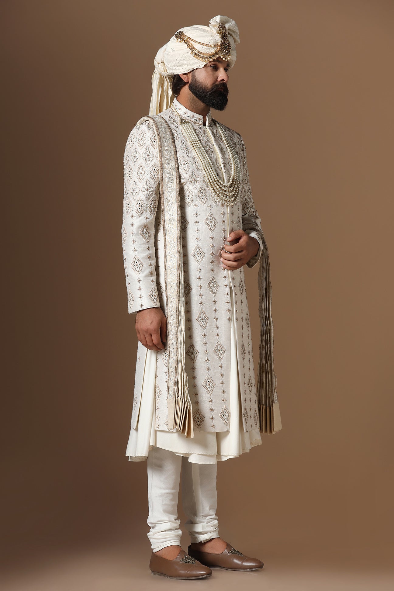 Elevate your style with this elegant Off- white Raw-Silk Sherwani. Shop Now!