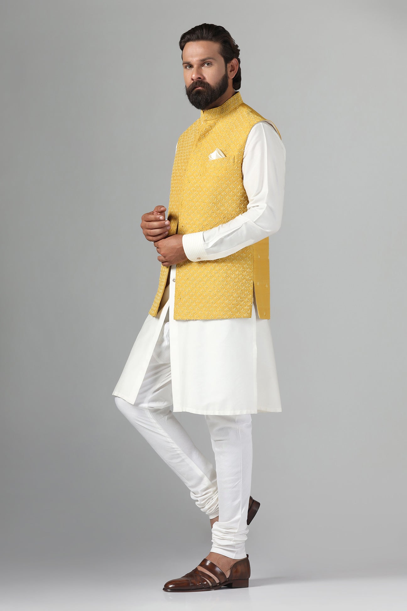 Elevate your style with our Yellow Nehru Jacket, adorned with tonal embroidery. Shop Now!