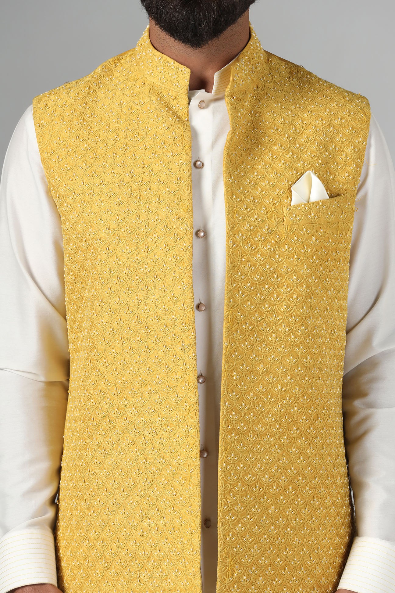Elevate your style with our Yellow Nehru Jacket, adorned with tonal embroidery. Shop Now!