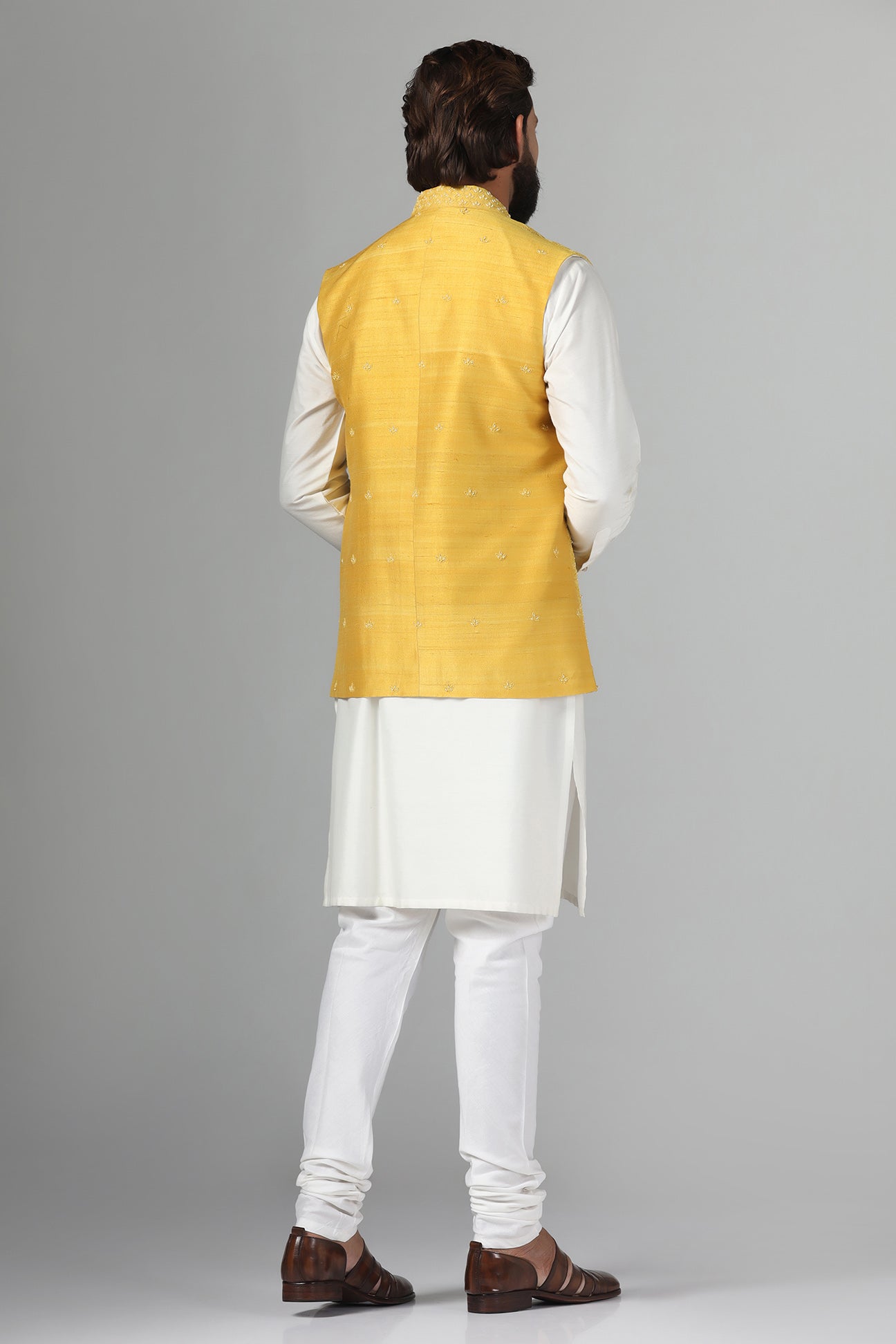 Elevate your style with our Yellow Nehru Jacket, adorned with tonal embroidery. Shop Now!
