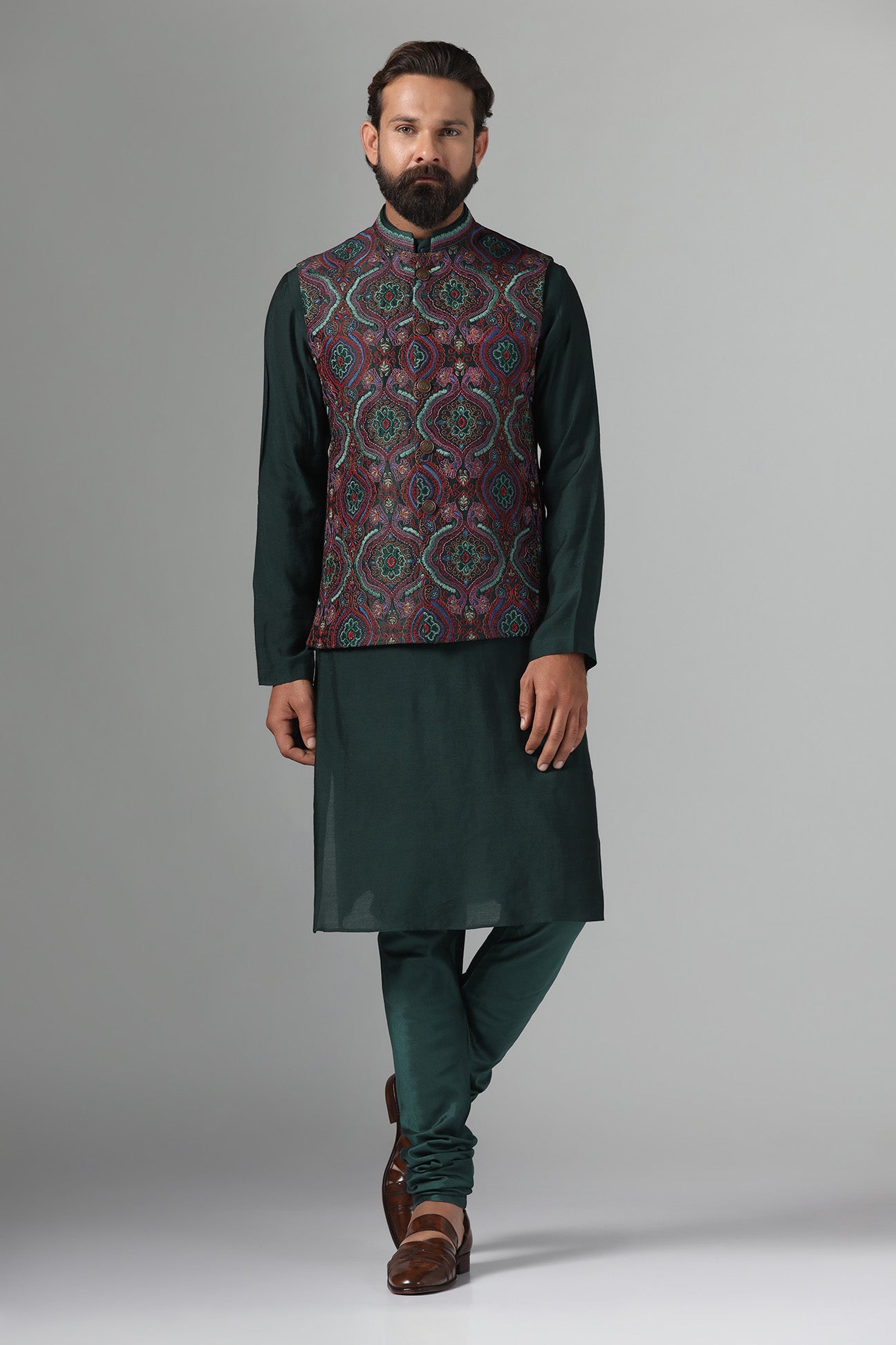 Stand out in style with our Nehru Jacket adorned in vibrant multi-colored embroidery. Shop Now!