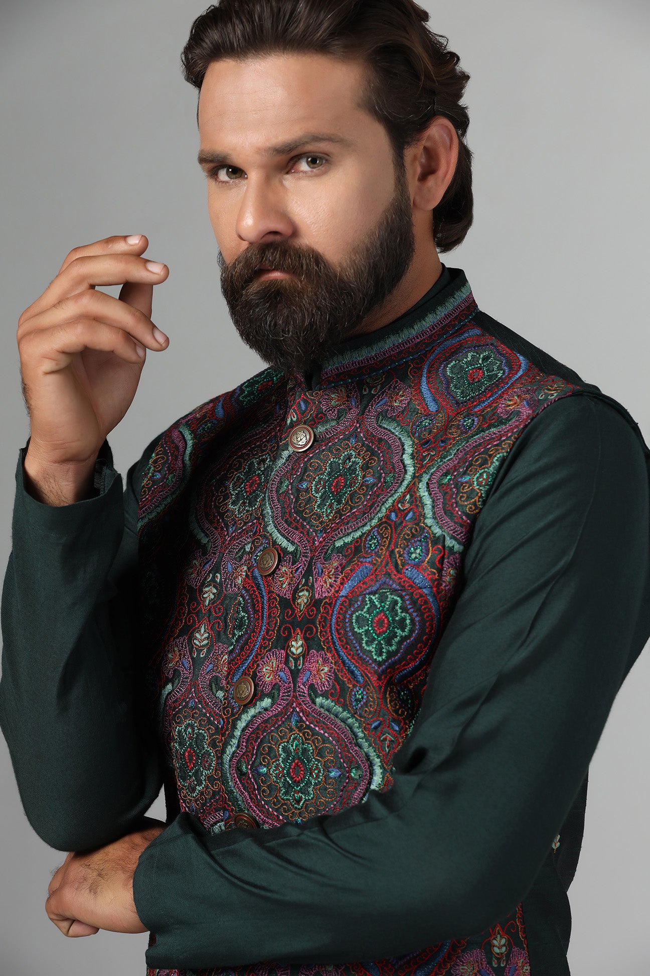Stand out in style with our Nehru Jacket adorned in vibrant multi-colored embroidery. Shop Now!