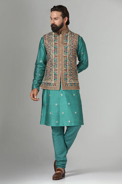 Make a statement with our Nehru jacket, adorned with vibrant multi-color embroidery. Paired with a short kurta and pajama set for effortless style.