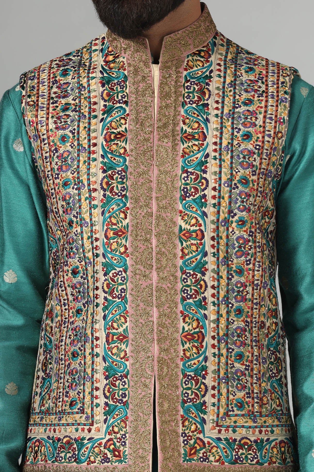 Make a statement with our Nehru jacket, adorned with vibrant multi-color embroidery. Shop Now!