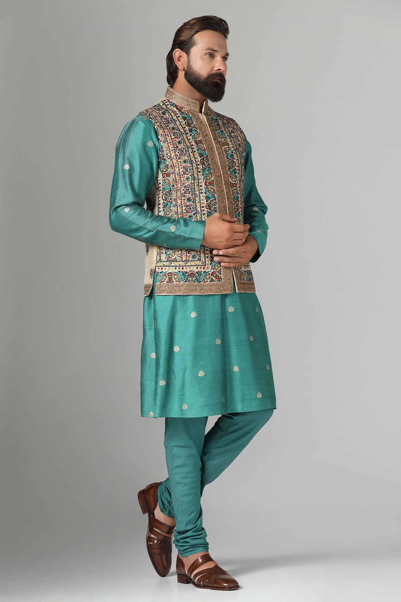 Make a statement with our Nehru jacket, adorned with vibrant multi-color embroidery. Shop Now!