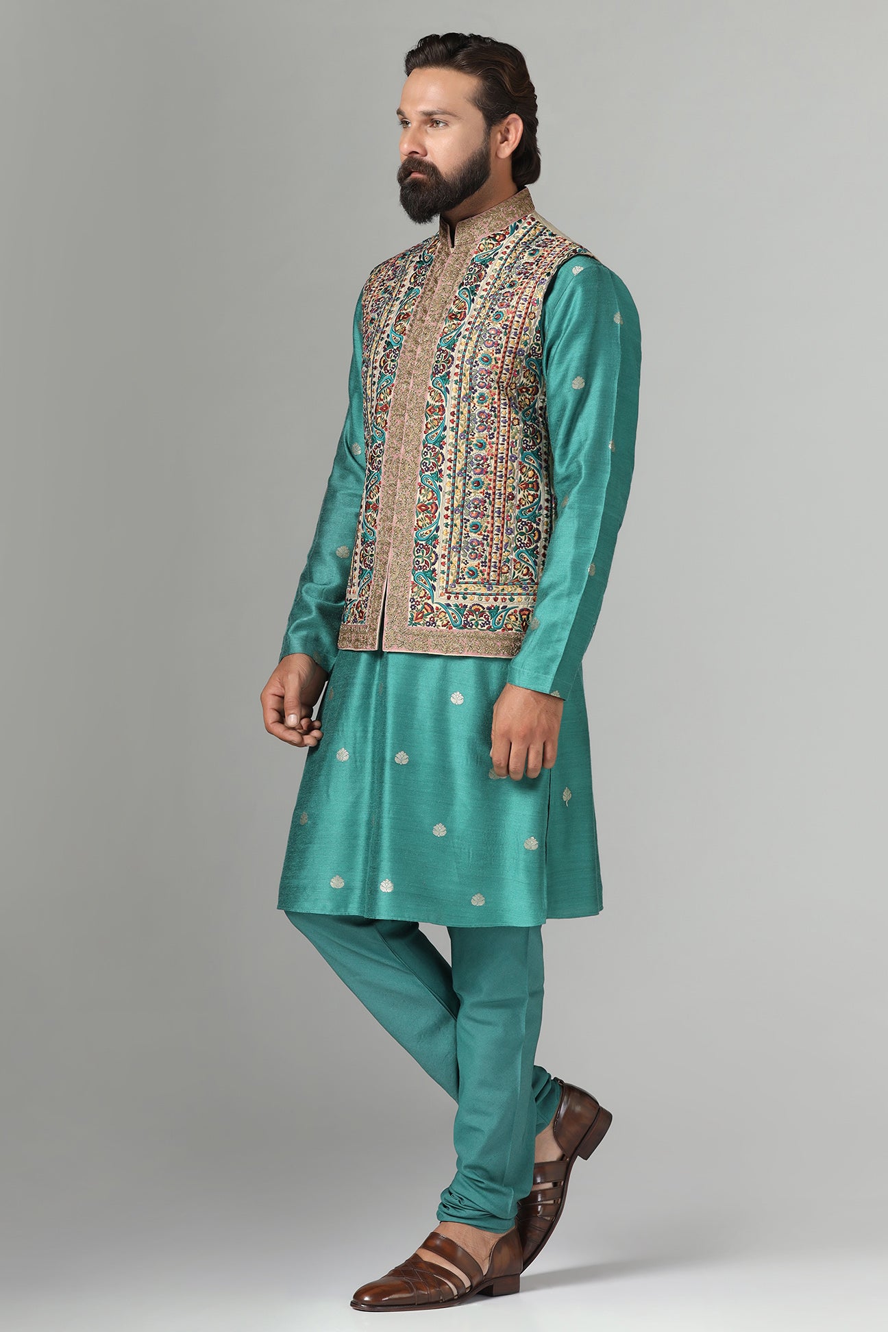Make a statement with our Nehru jacket, adorned with vibrant multi-color embroidery. Shop Now!