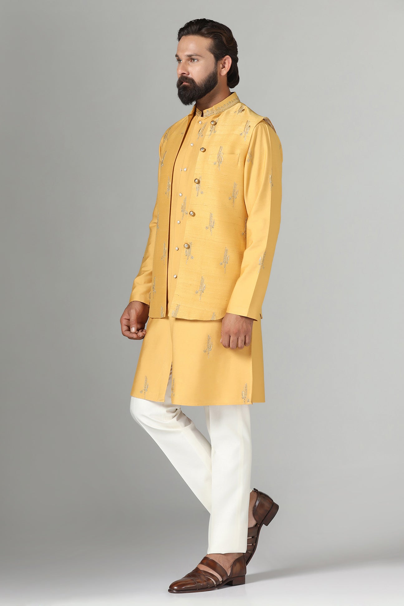 Elevate your style with our Raw-Silk Nehru jacket adorned with delicate embroidery. Shop Now!