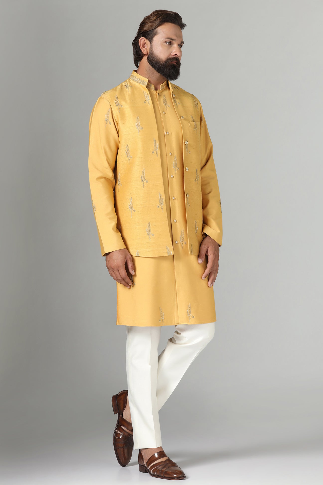 Elevate your style with our Raw-Silk Nehru jacket adorned with delicate embroidery. Shop Now!