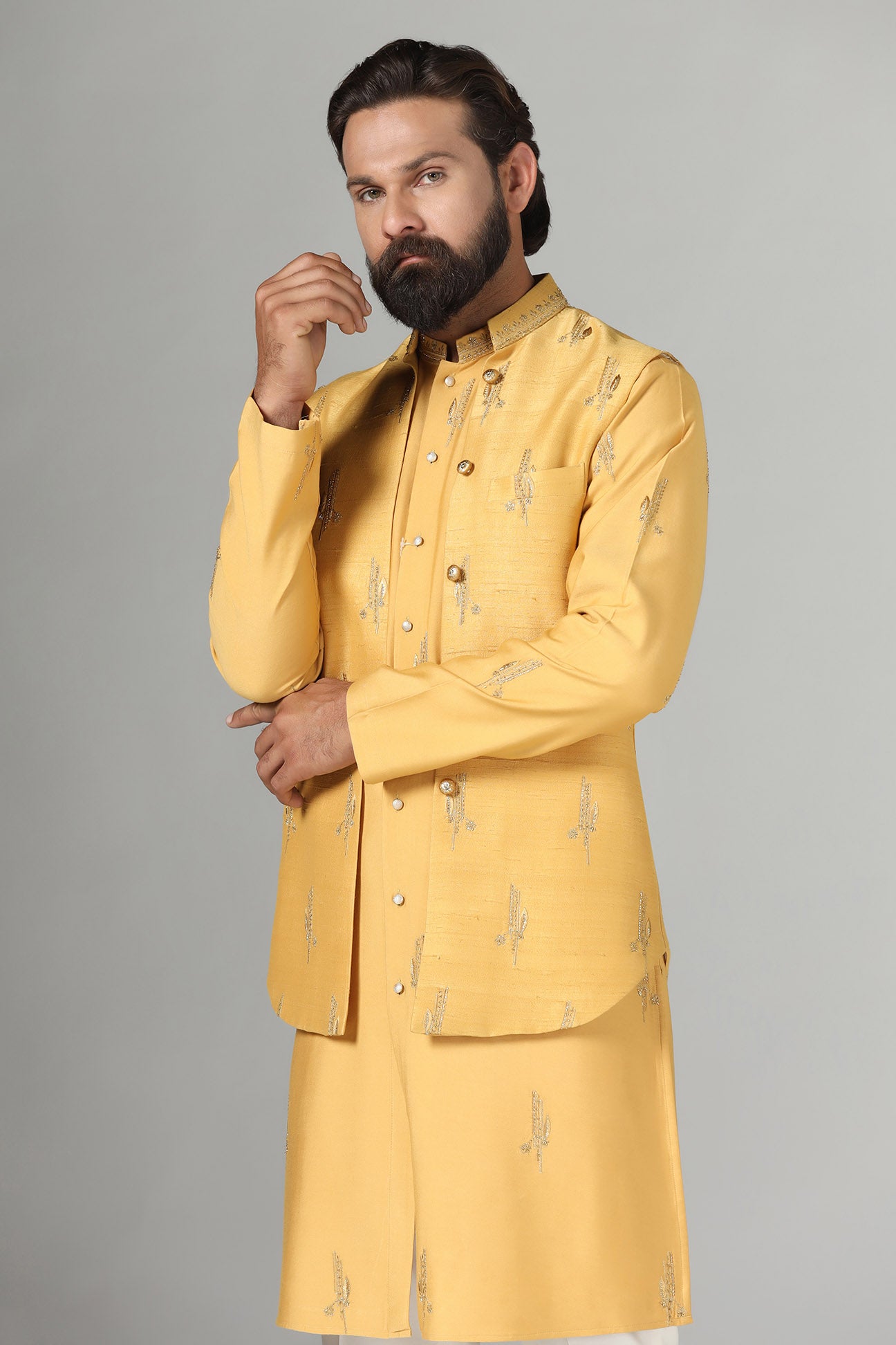 Elevate your style with our Raw-Silk Nehru jacket adorned with delicate embroidery. Shop Now!