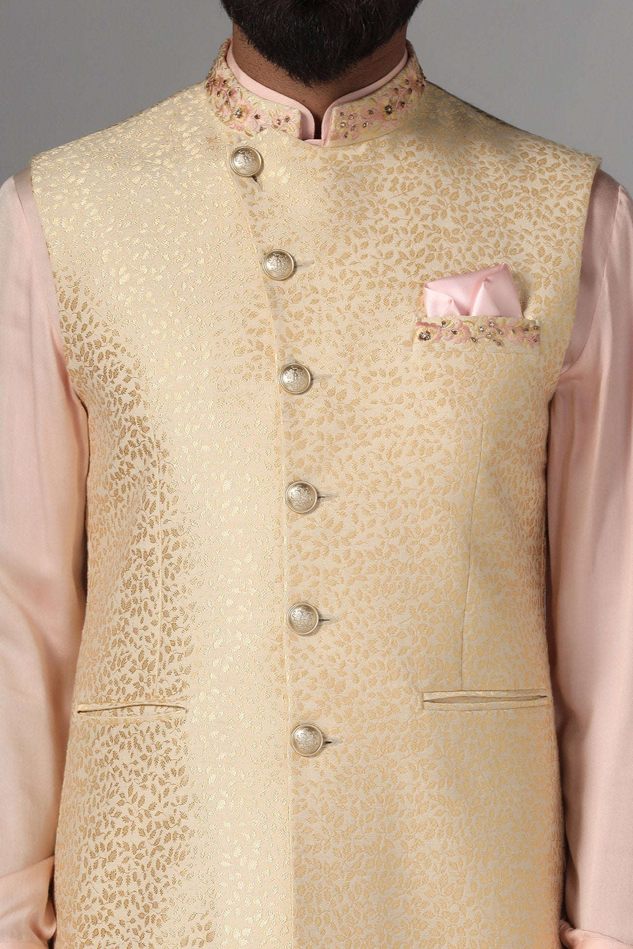 Elevate your ensemble with this exquisite golden jacquard Nehru jacket. Shop Now!