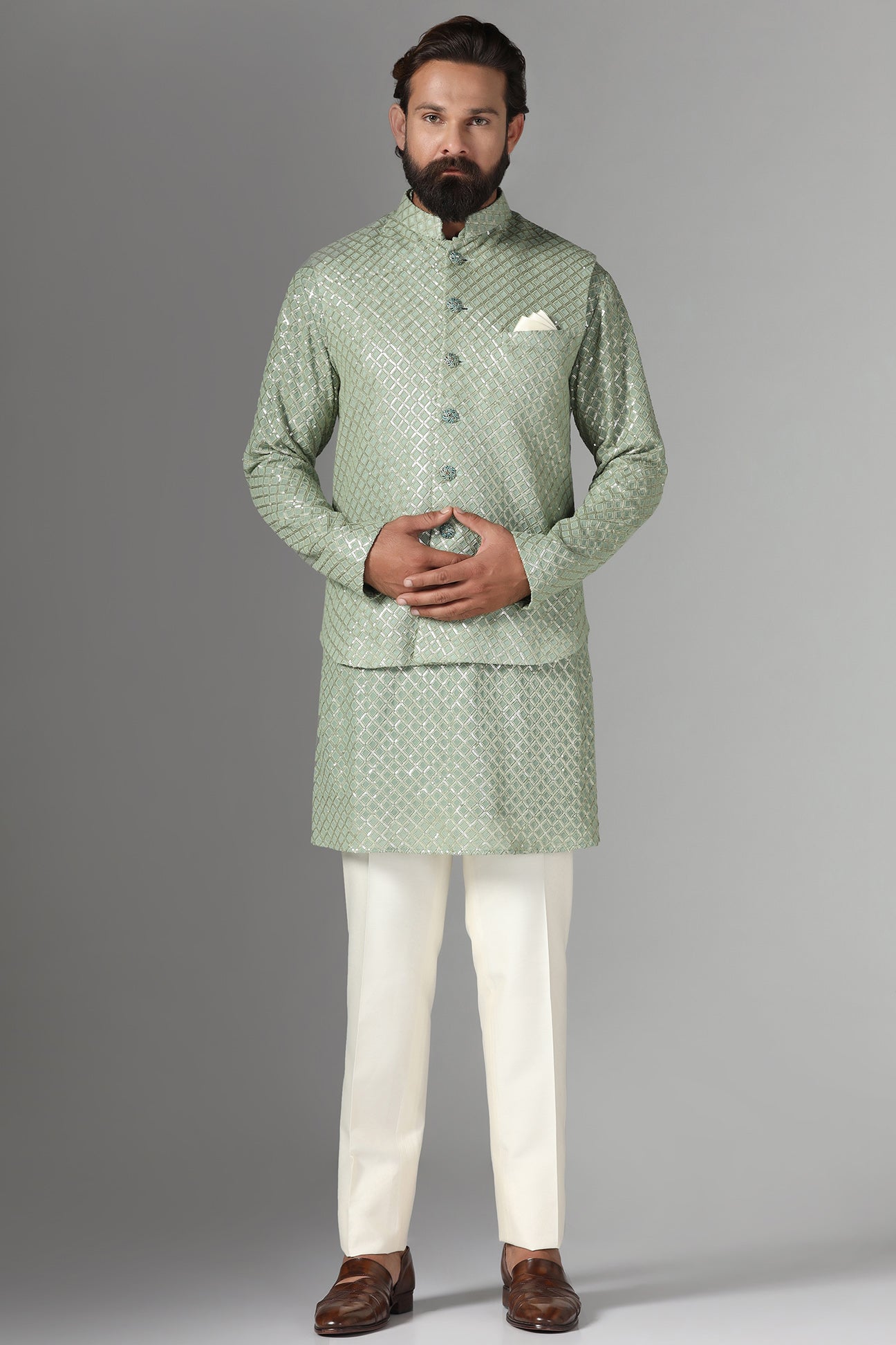 Radiate elegance in our light green Nehru Jacket adorned with sequin embroidery. Shop Now!
