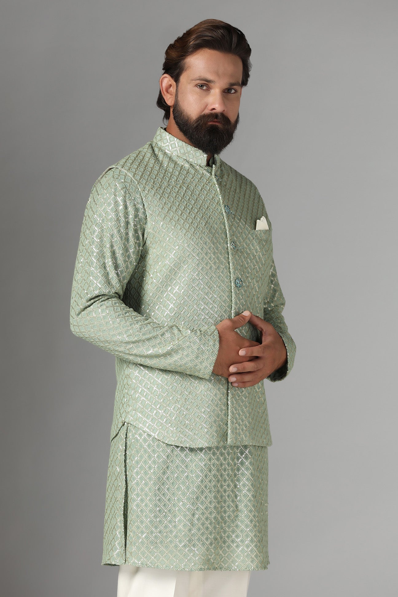 Radiate elegance in our light green Nehru Jacket adorned with sequin embroidery. Shop Now!