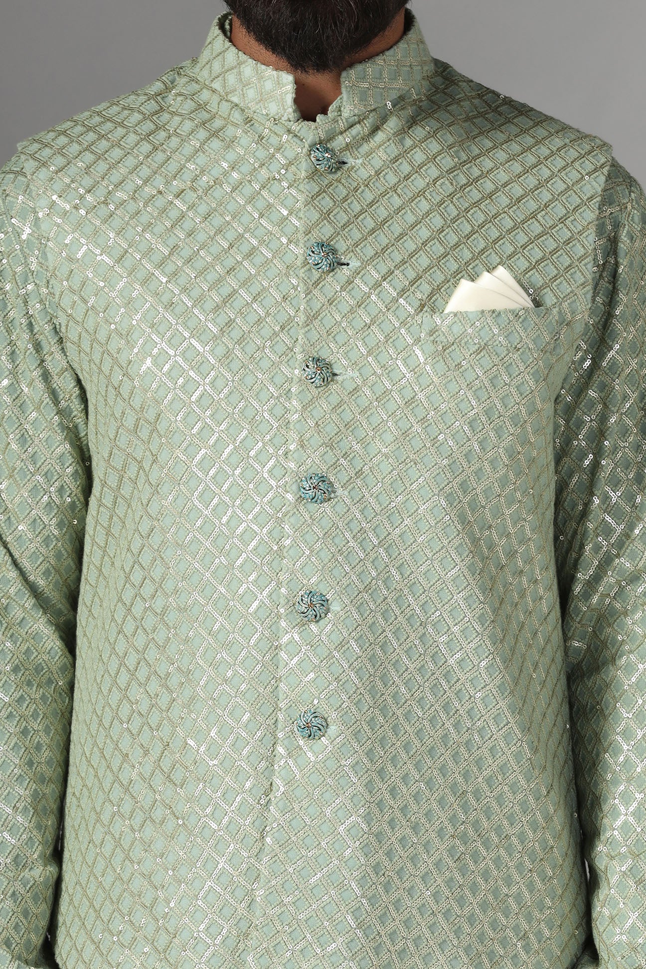 Radiate elegance in our light green Nehru Jacket adorned with sequin embroidery. Shop Now!