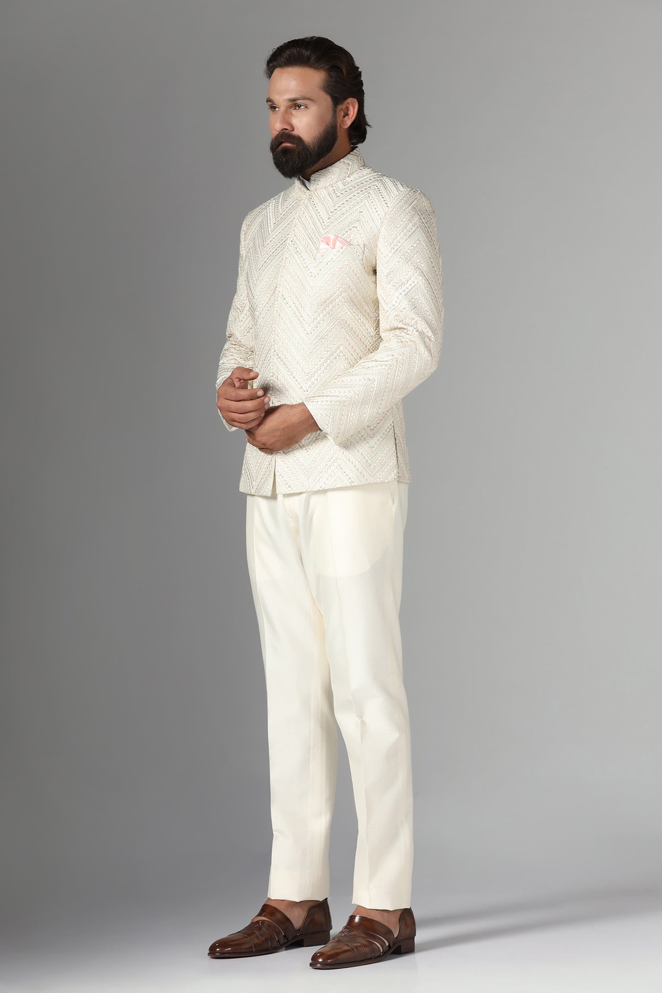Elevate style with our off-white Bandhgala suit in raw-silk fabric. Shop Now!