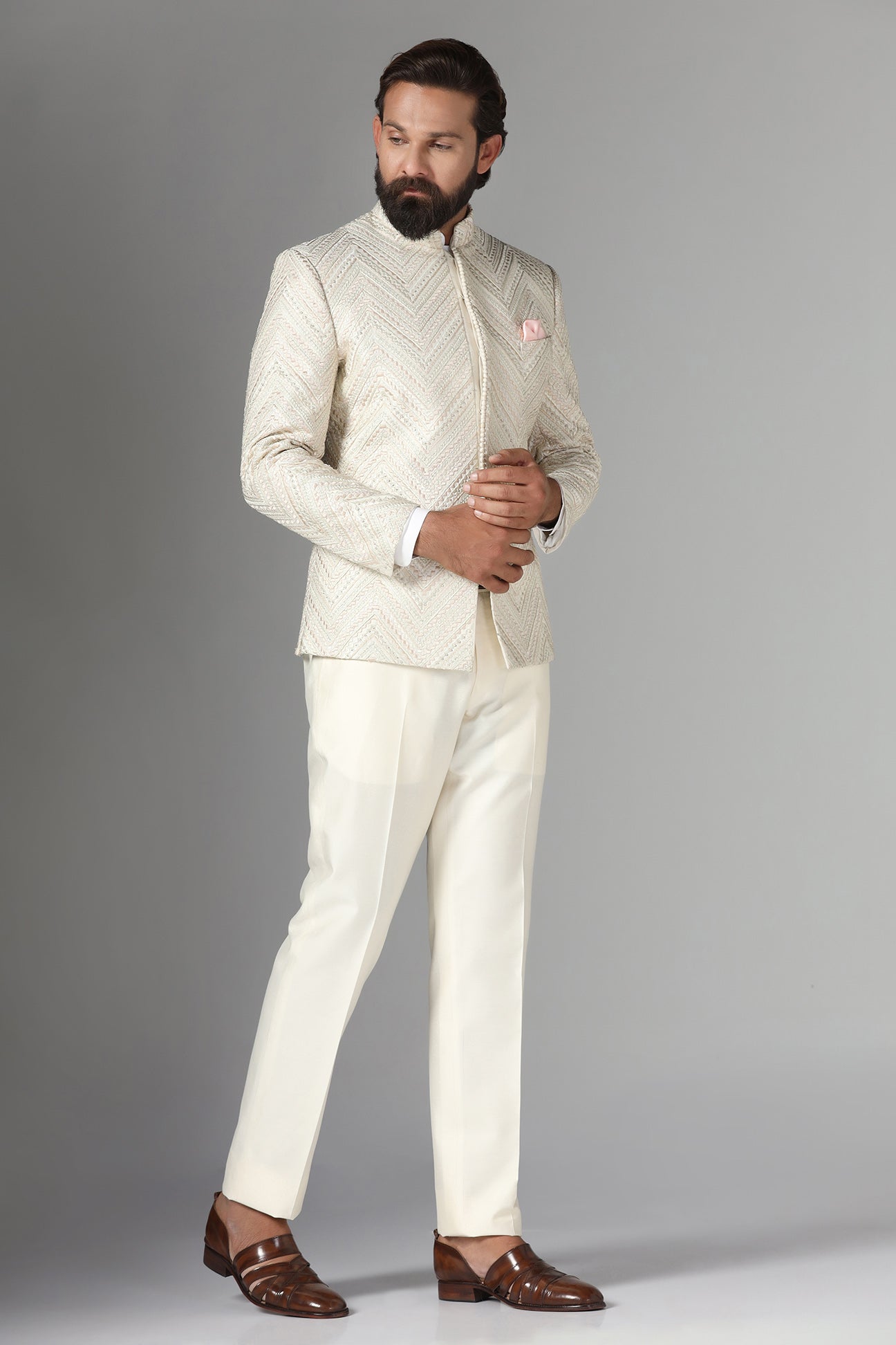 Elevate style with our off-white Bandhgala suit in raw-silk fabric. Shop Now!