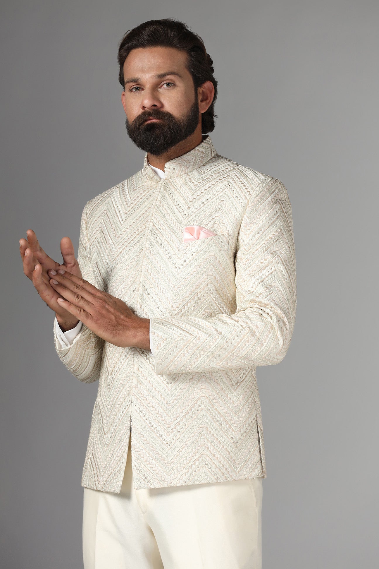 Elevate style with our off-white Bandhgala suit in raw-silk fabric. Shop Now!