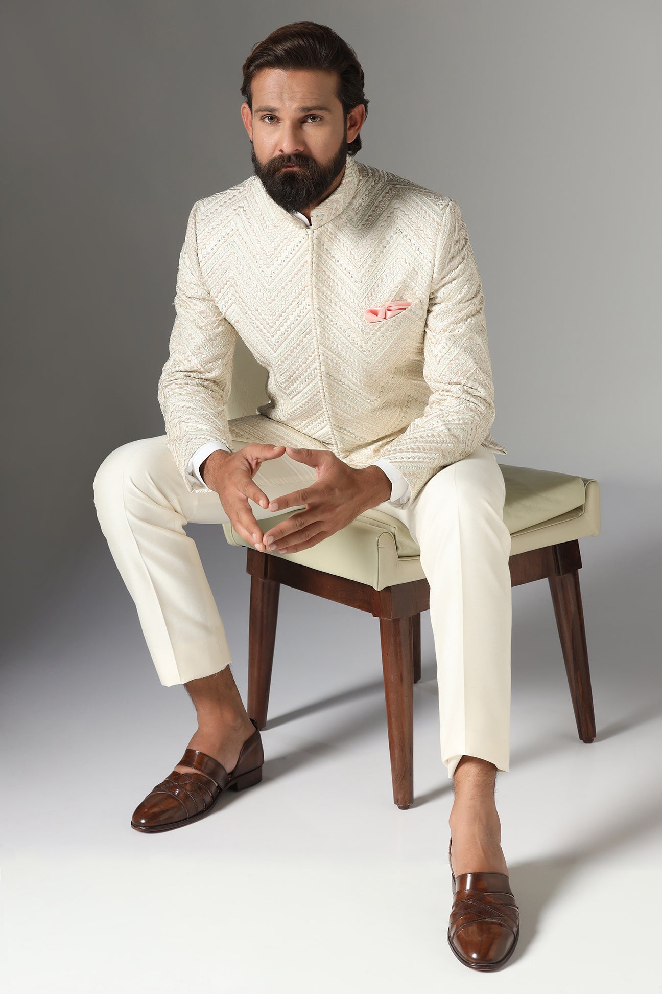 Elevate style with our off-white Bandhgala suit in raw-silk fabric. Shop Now!
