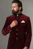 Step into sophistication with our maroon Bandhgala suit in rich velvet fabric. Shop Now!