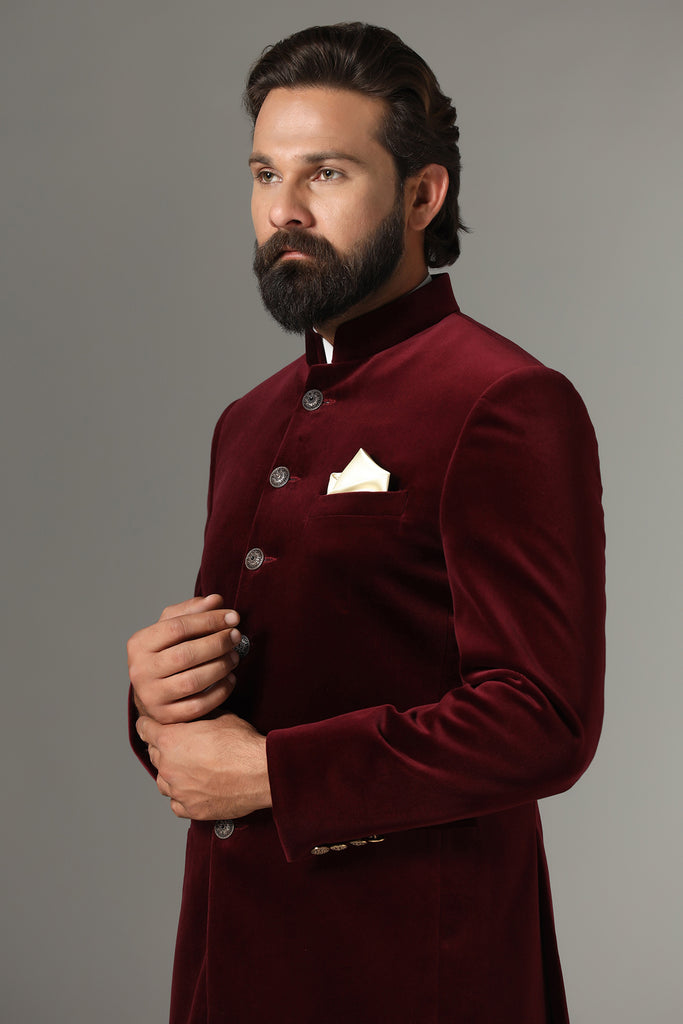 Step into sophistication with our maroon Bandhgala suit in rich velvet fabric. Shop Now!