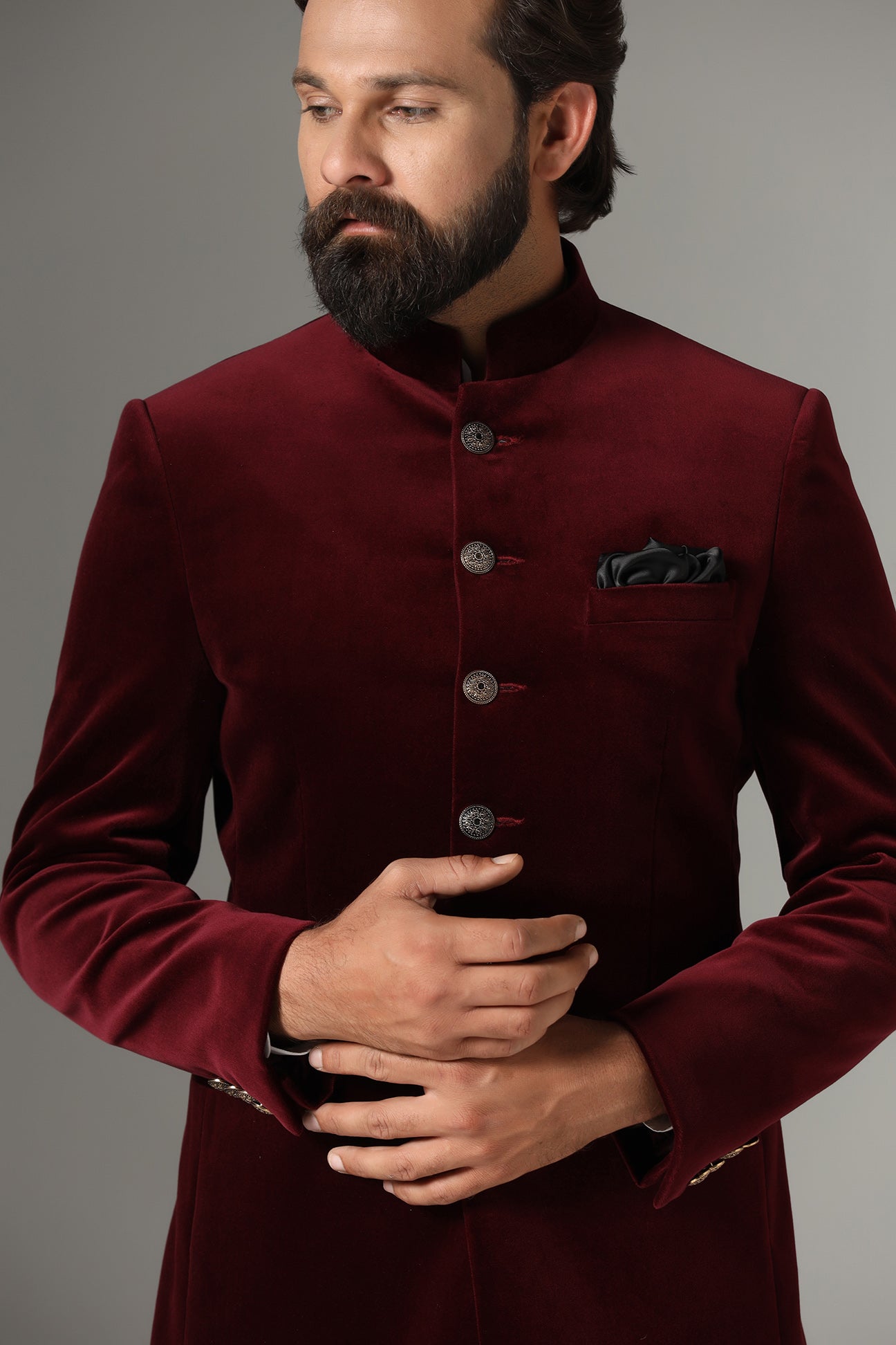 Dress in regal elegance with our Velvet Maroon Bandhgala Suit featuring a contrast closure. Buy Now!