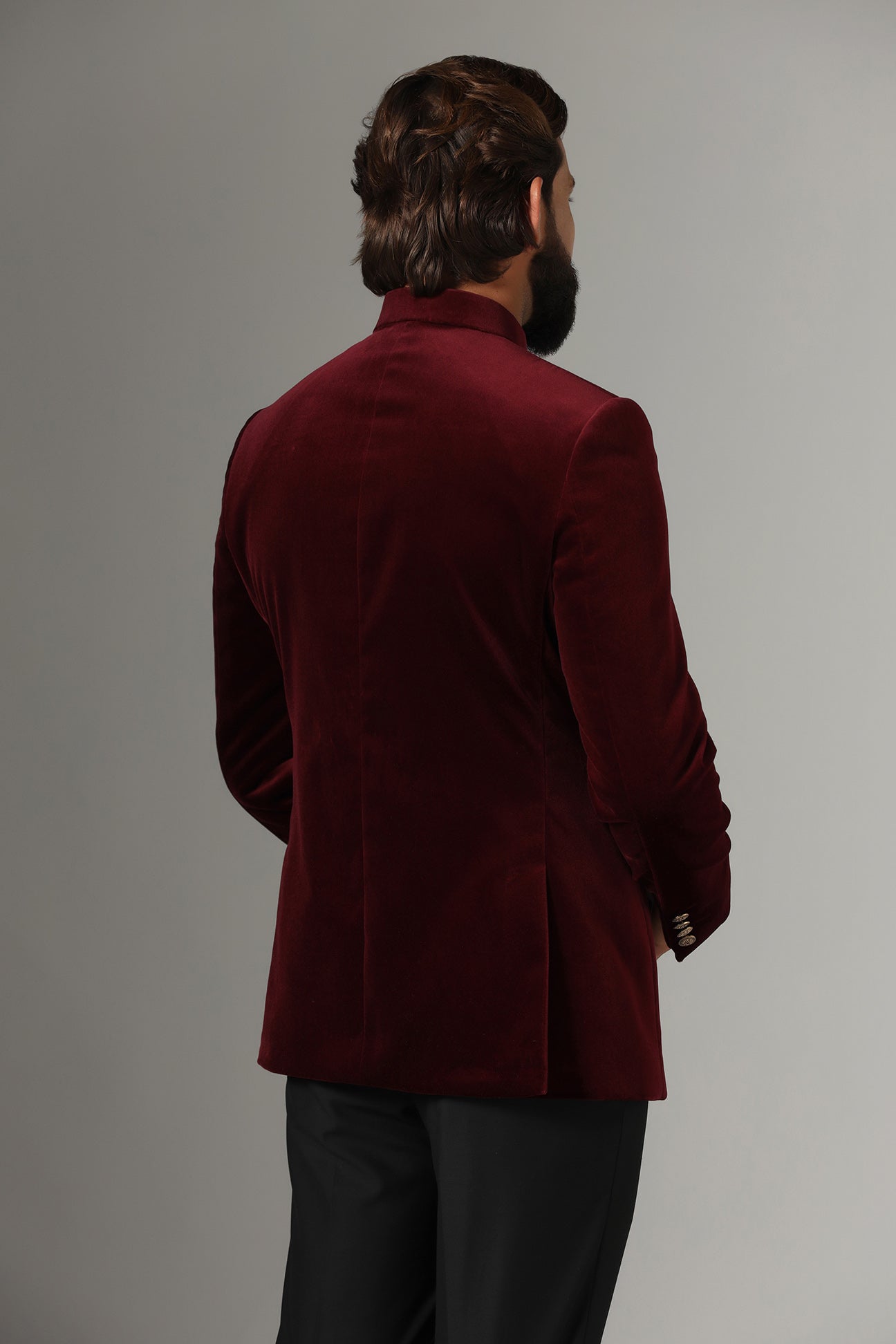 Dress in regal elegance with our Velvet Maroon Bandhgala Suit featuring a contrast closure. Buy Now!