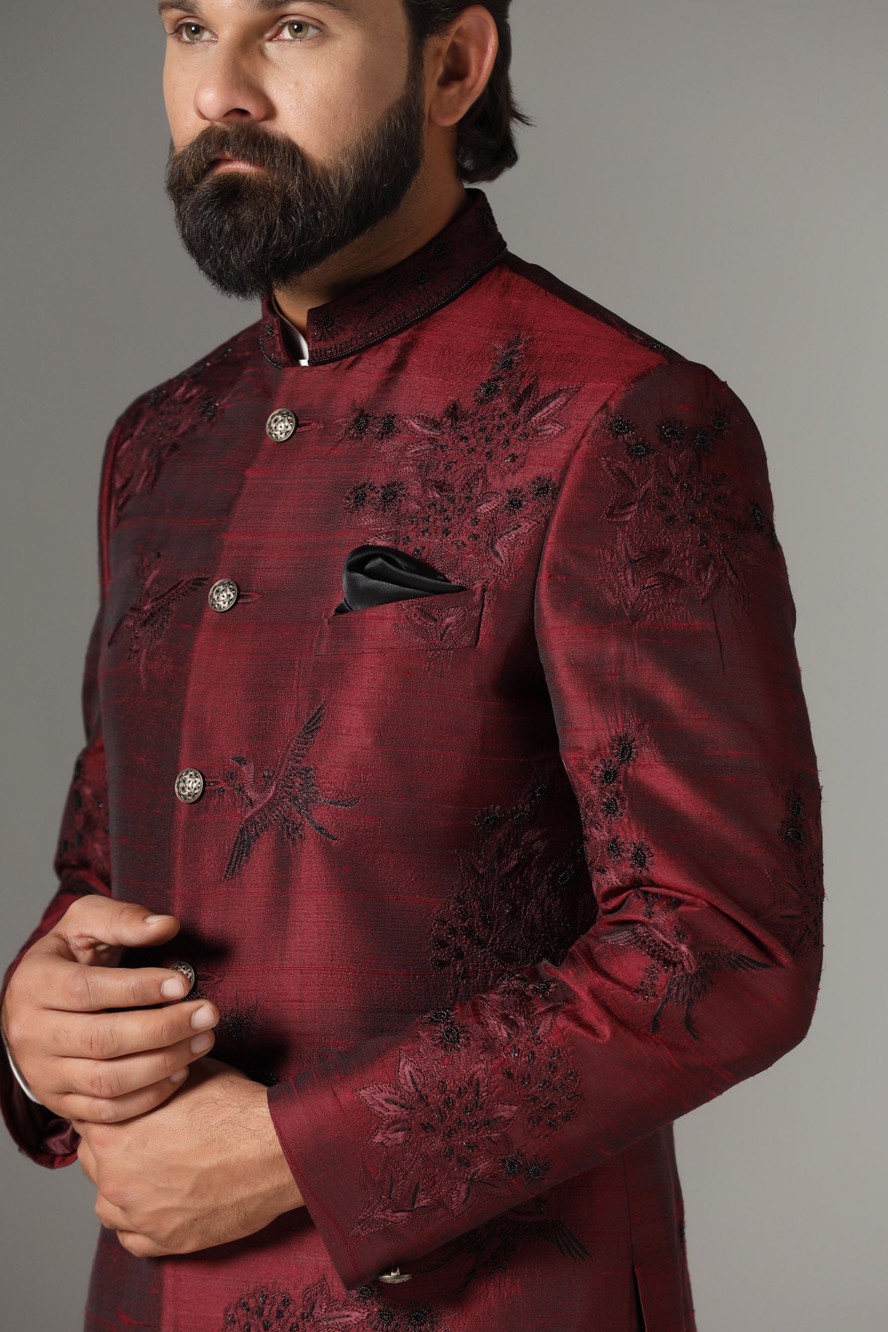 Experience luxury with the Maroon Raw Silk Bandhgala Suit. Crafted for style Shop now!