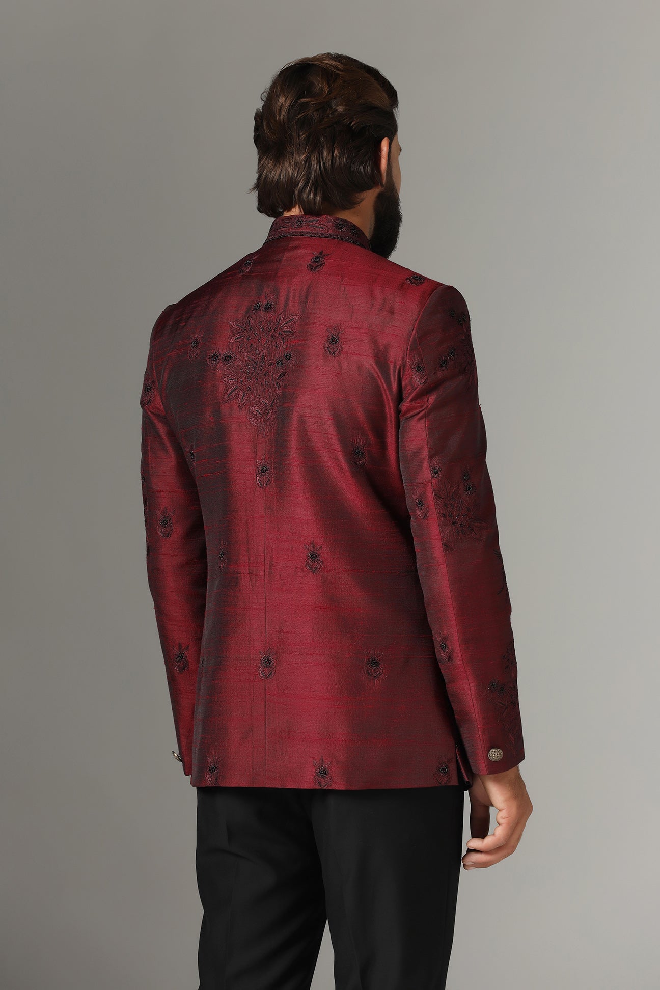 Experience luxury with the Maroon Raw Silk Bandhgala Suit. Crafted for style Shop now!