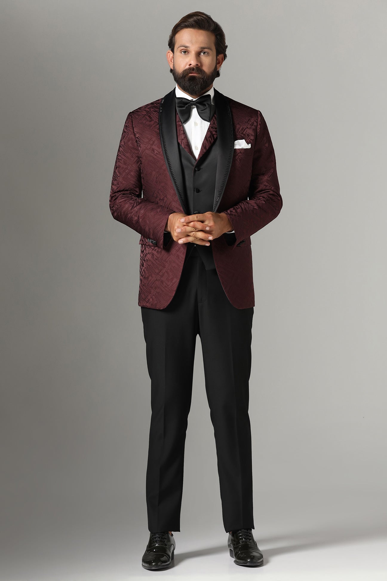 Elevate your style with our Textured Maroon Tuxedo. Shop Now!