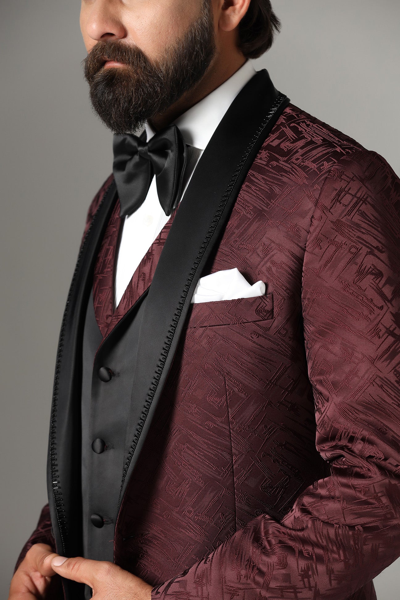 EElevate your style with our Textured Maroon Tuxedo. Shop Now!