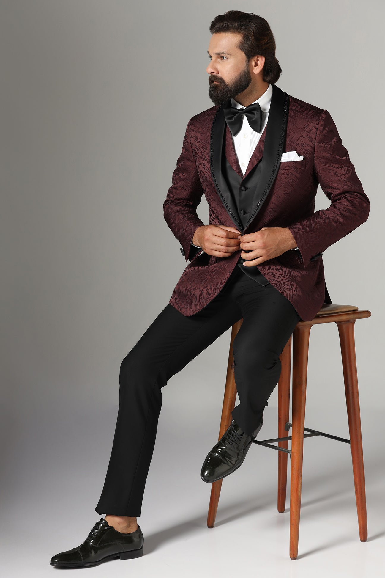 Elevate your style with our Textured Maroon Tuxedo. Shop Now!