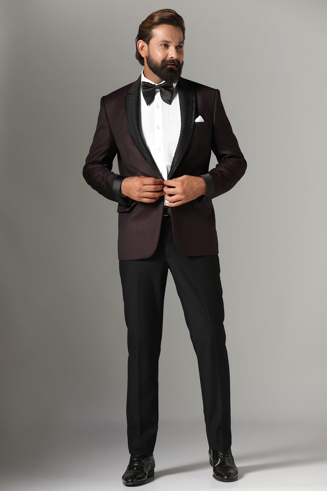 Elevate your style with our Wine-Textured Tuxedo. Shop Now!