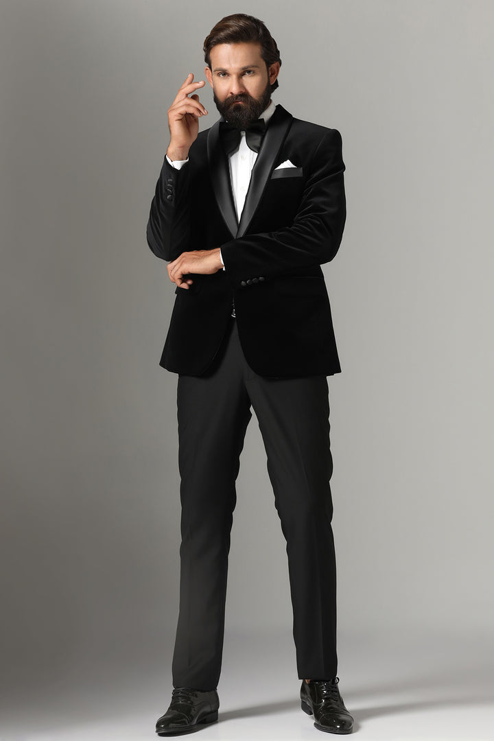 Distinguished elegance in our Black Velvet Tuxedo. Shop Now!