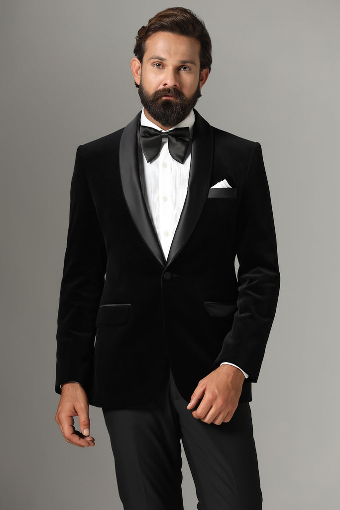 Distinguished elegance in our Black Velvet Tuxedo. Satin shawl collar, paired with Jet-Black trousers for a refined and sophisticated look.