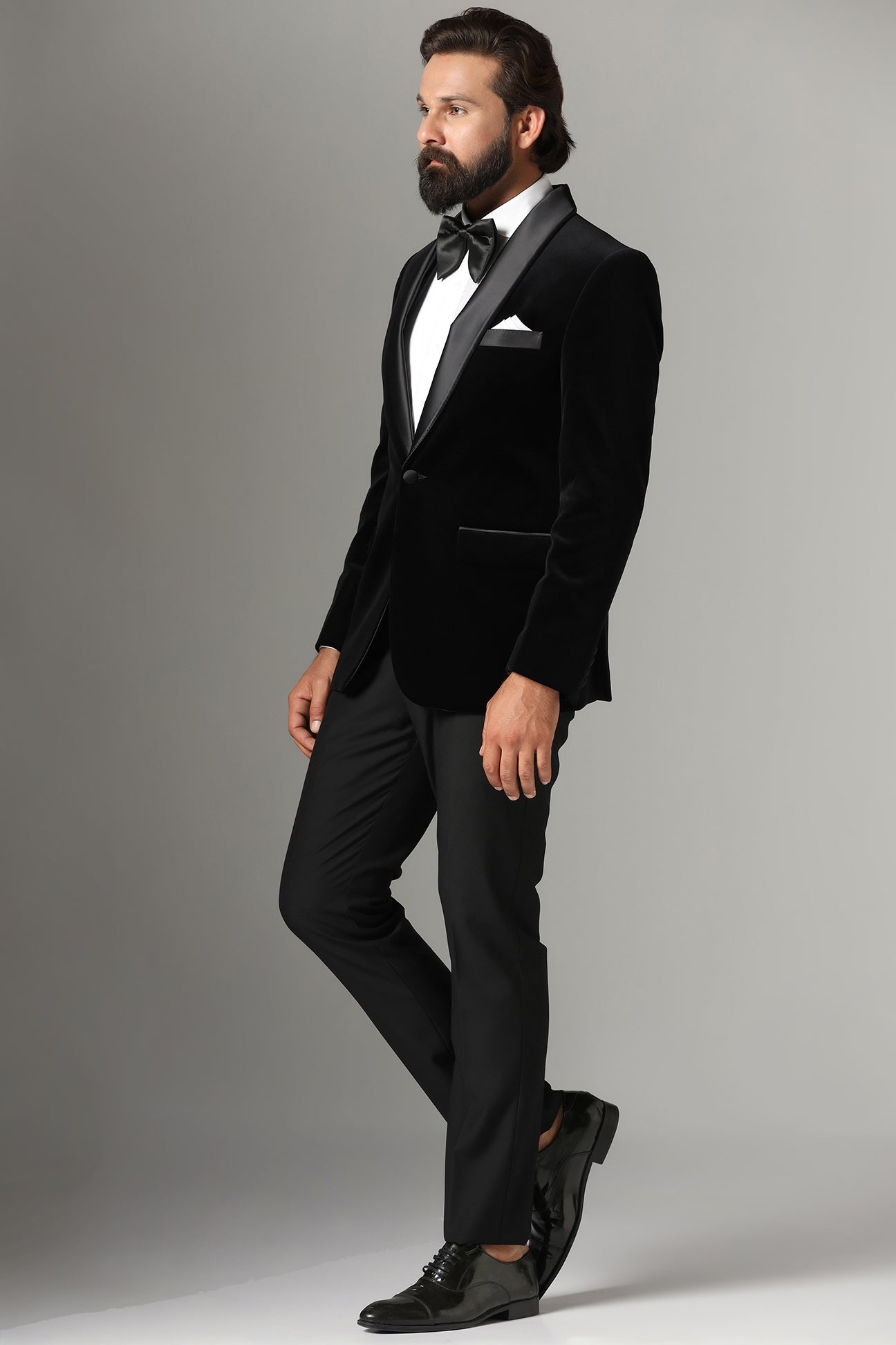 Distinguished elegance in our Black Velvet Tuxedo. Shop Now!