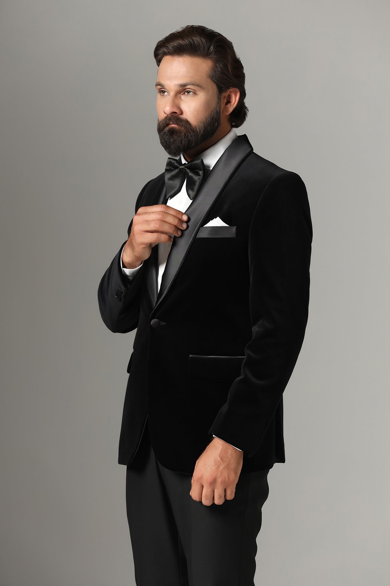 Distinguished elegance in our Black Velvet Tuxedo. Shop Now!