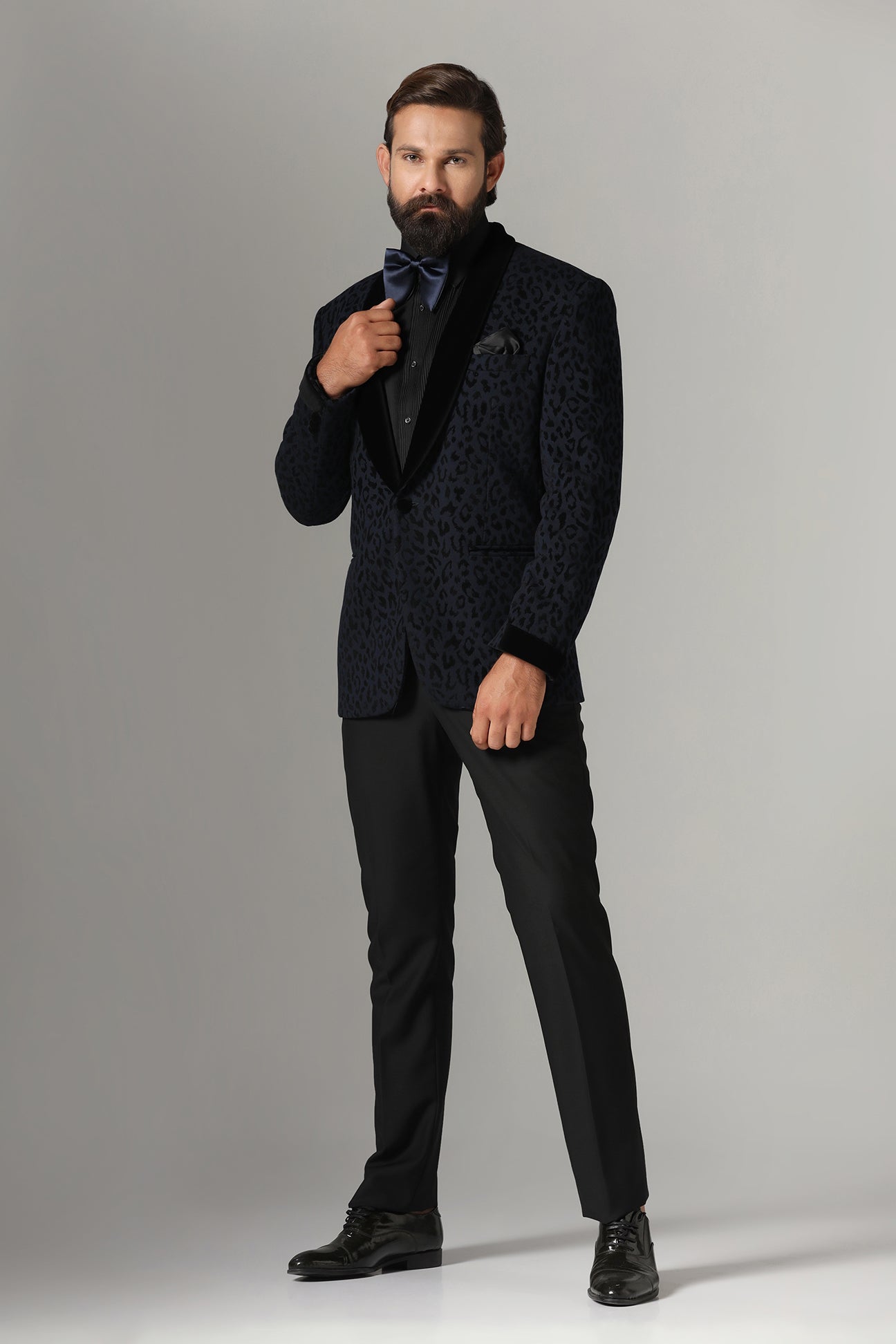 Distinguished elegance in our Textured Navy Blue Tuxedo. Shop Now!