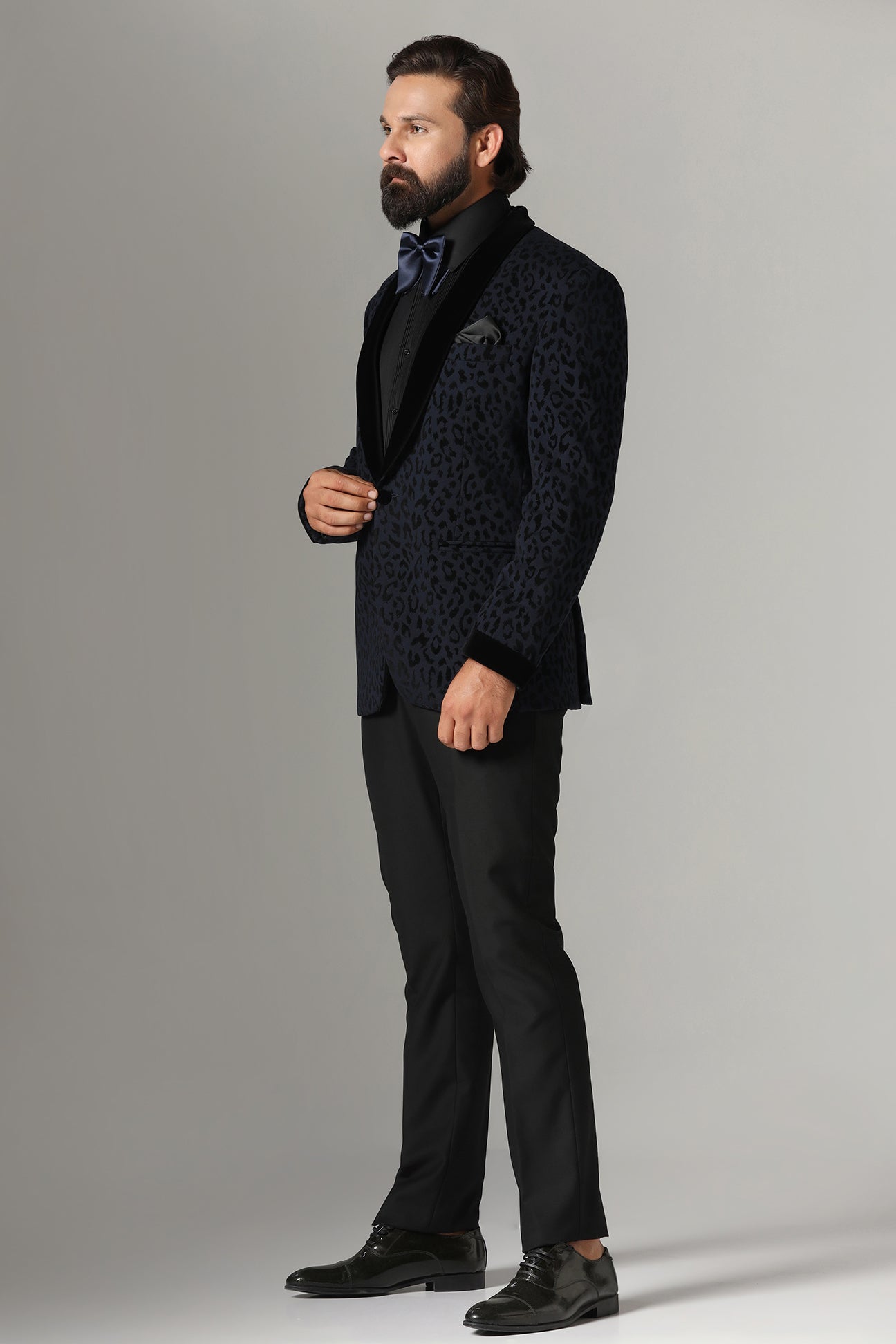 Distinguished elegance in our Textured Navy Blue Tuxedo. Shop Now!