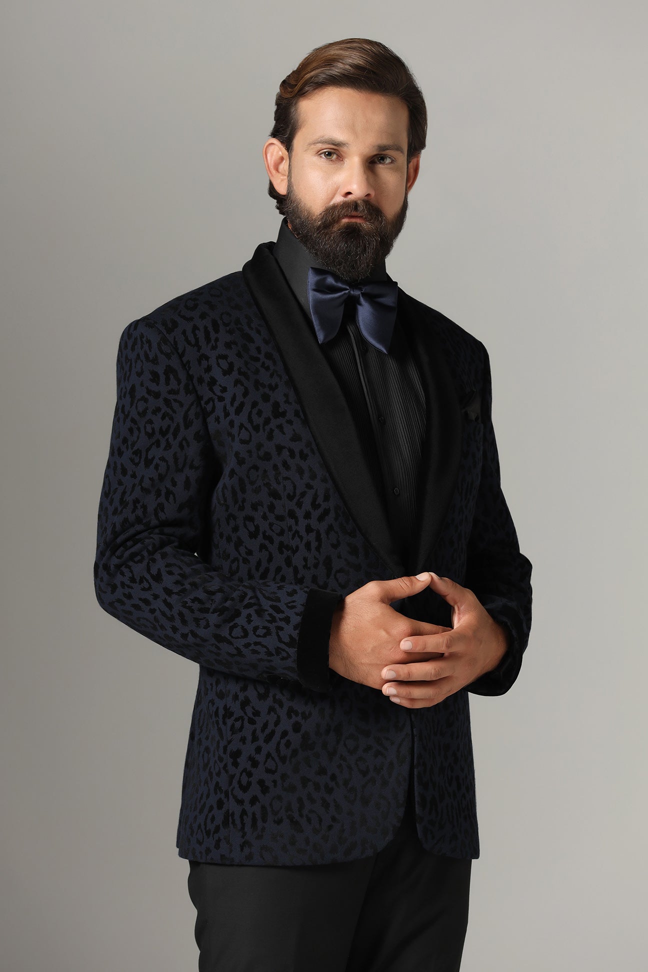 Distinguished elegance in our Textured Navy Blue Tuxedo. Shop Now!