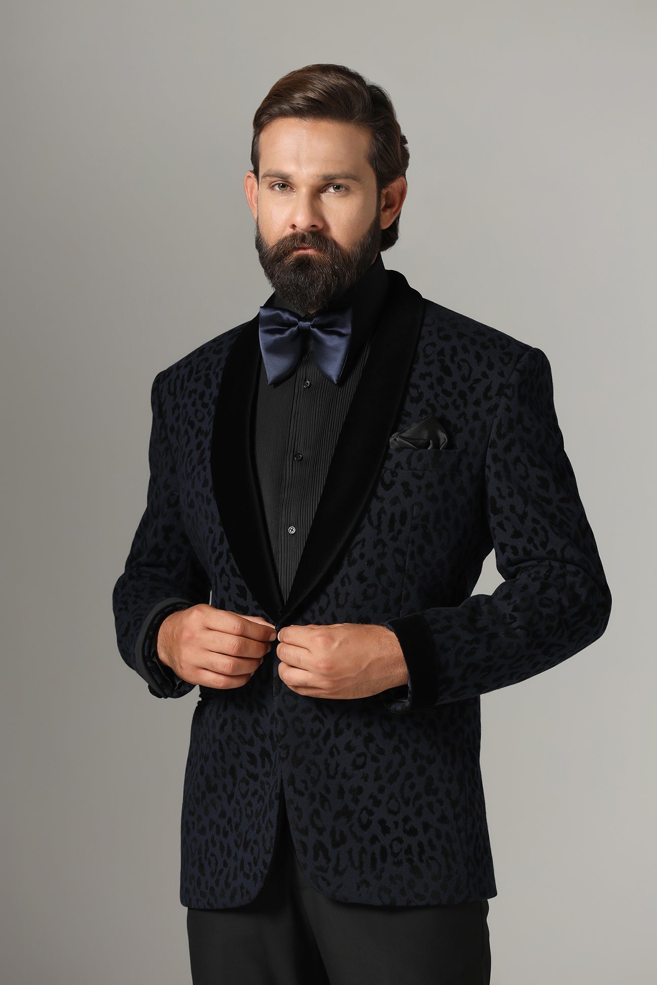 Distinguished elegance in our Textured Navy Blue Tuxedo. Shop Now!