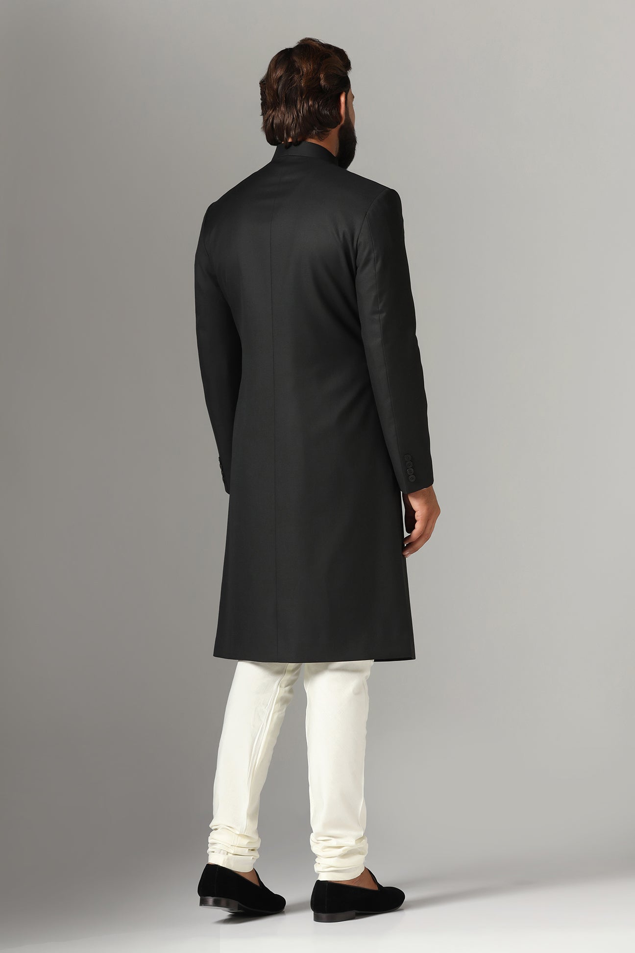 Elevate your style with our black Indowestern ensemble from luxurious wool-rich fabric. Shop Now!