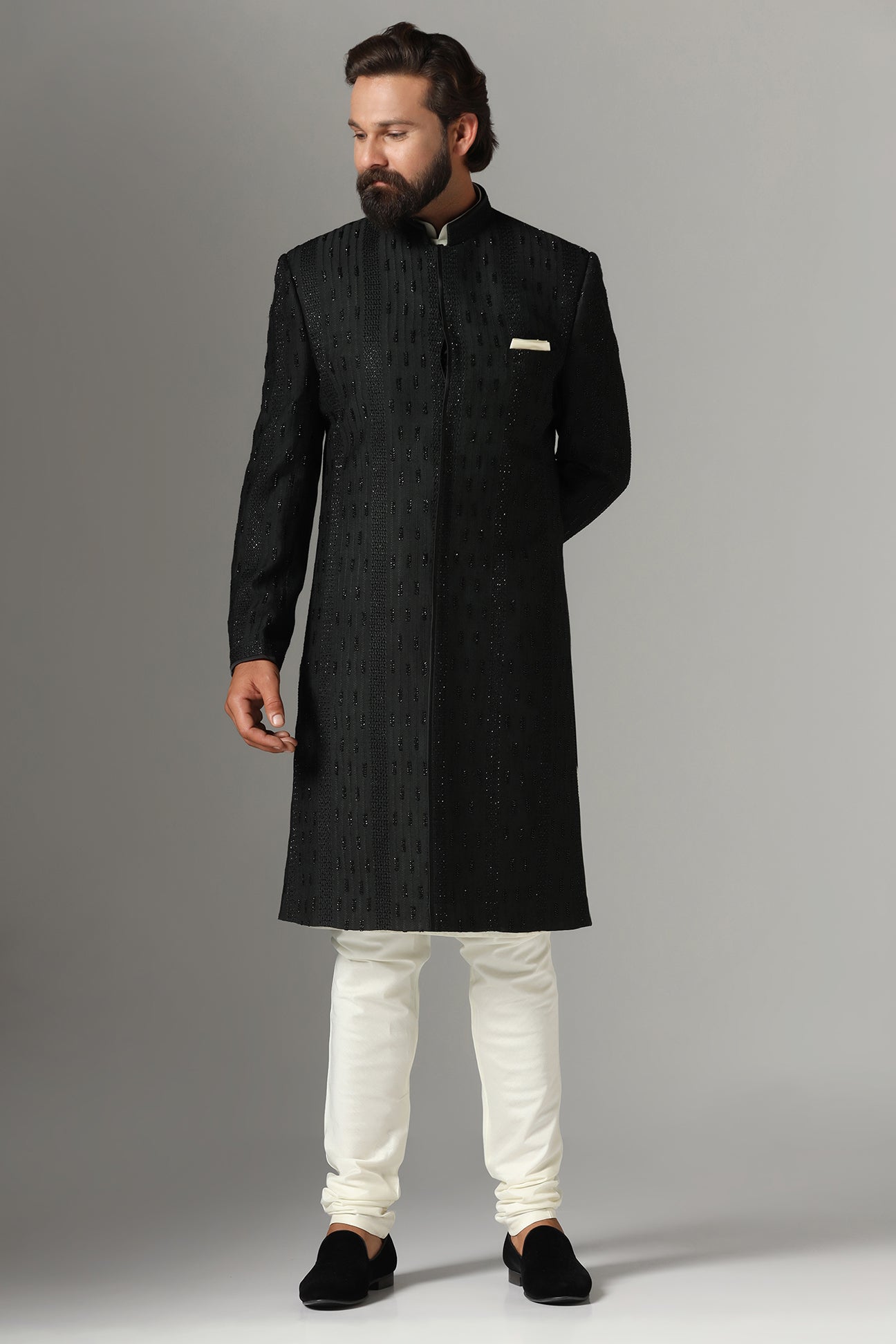 This black Indo-Western is highlighted with tonal embroidery all across the garment. Shop Now!