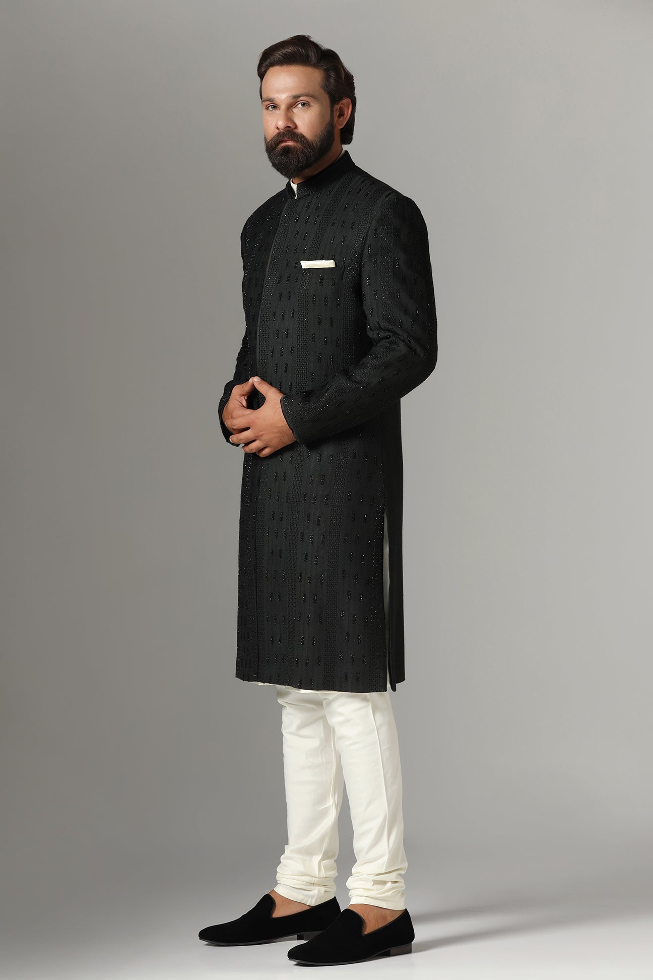 This black Indo-Western is highlighted with tonal embroidery all across the garment. Shop Now!