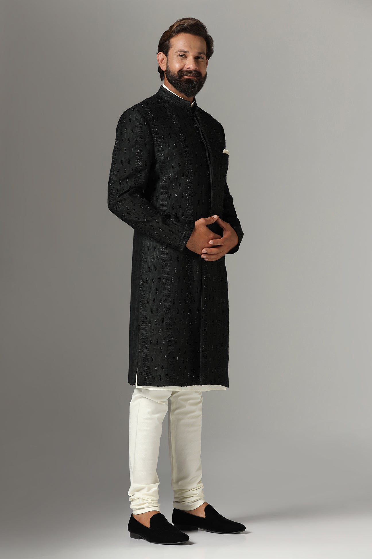 This black Indo-Western is highlighted with tonal embroidery all across the garment. Shop Now!