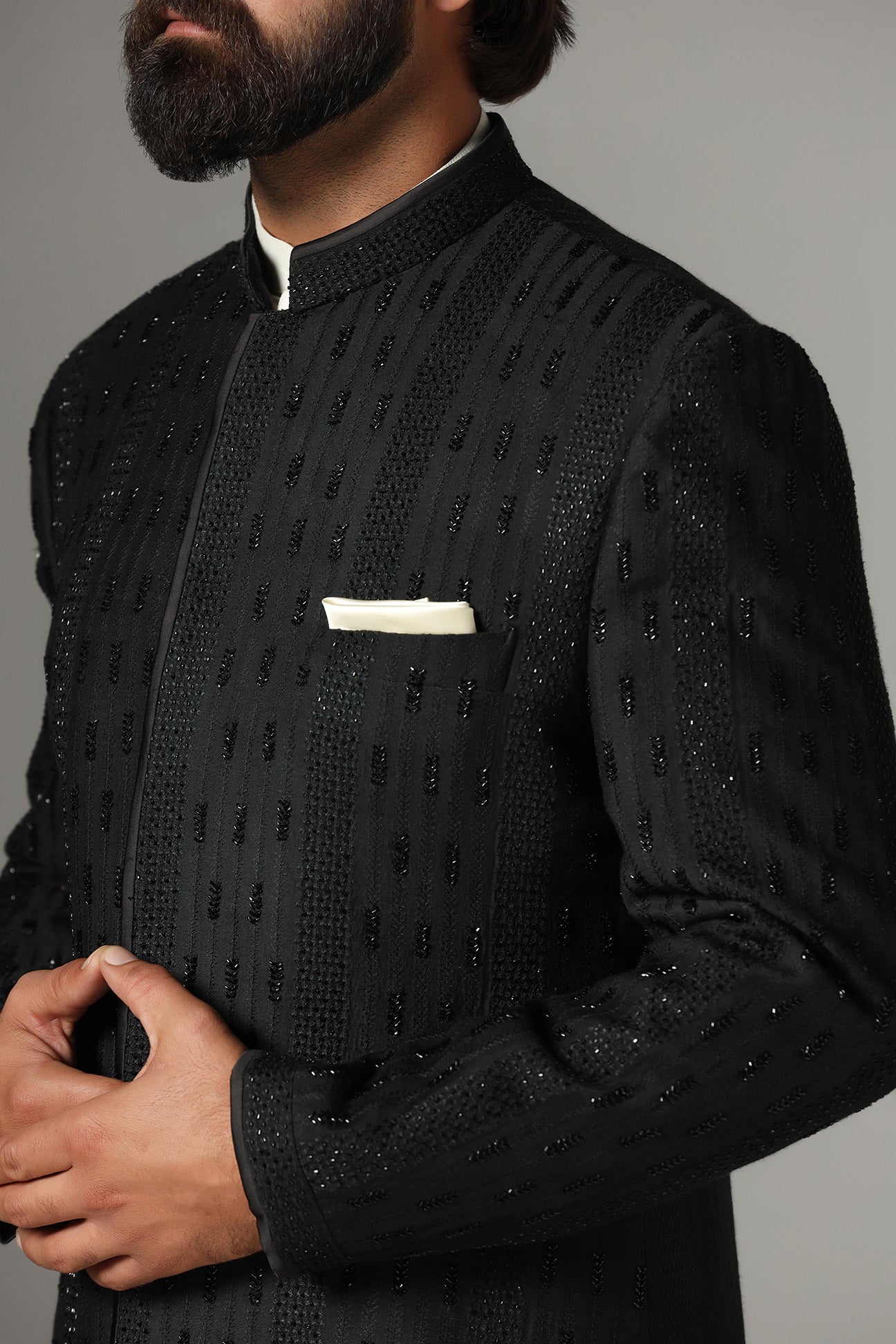 This black Indo-Western is highlighted with tonal embroidery all across the garment. Shop Now!