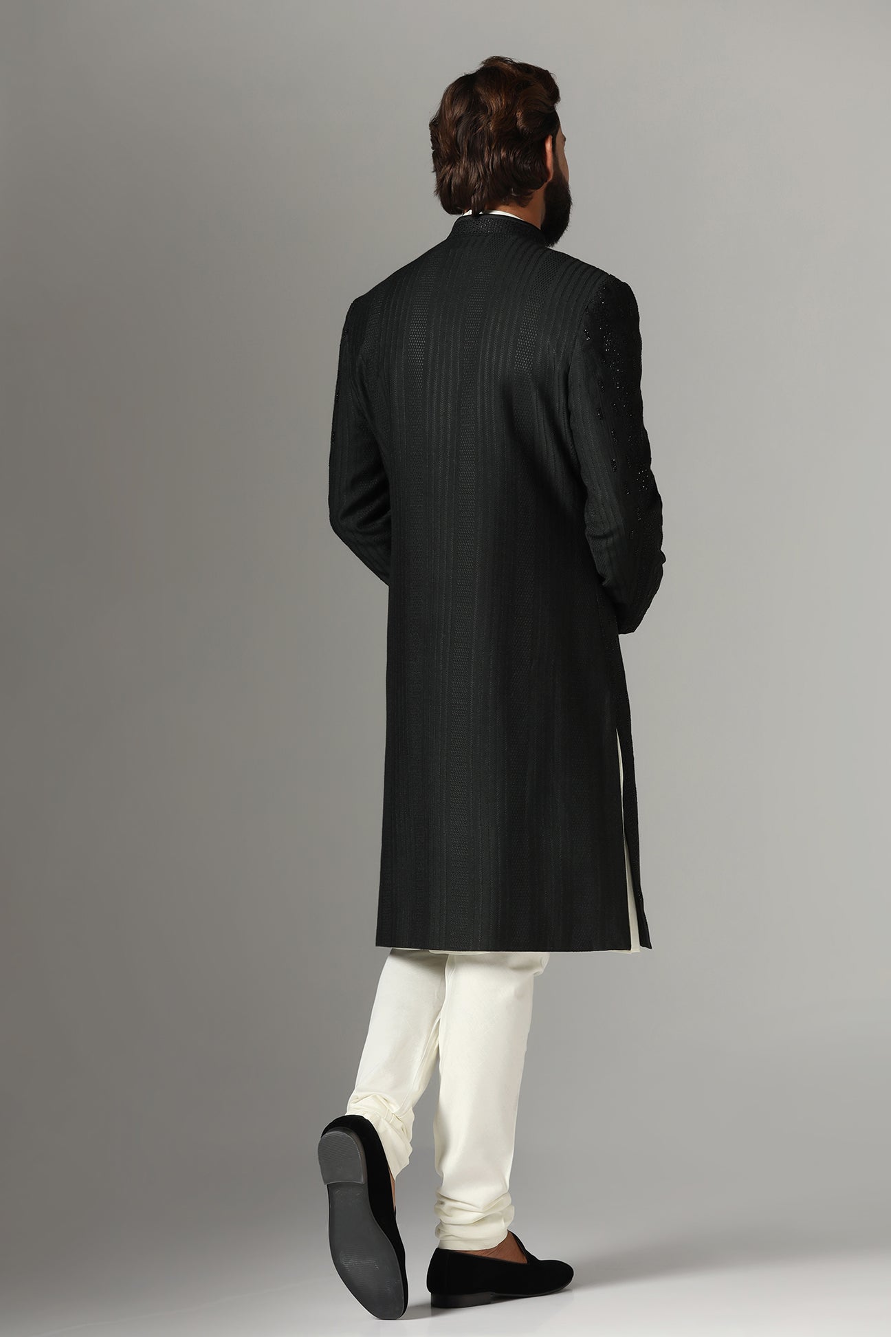 This black Indo-Western is highlighted with tonal embroidery all across the garment. Shop Now!