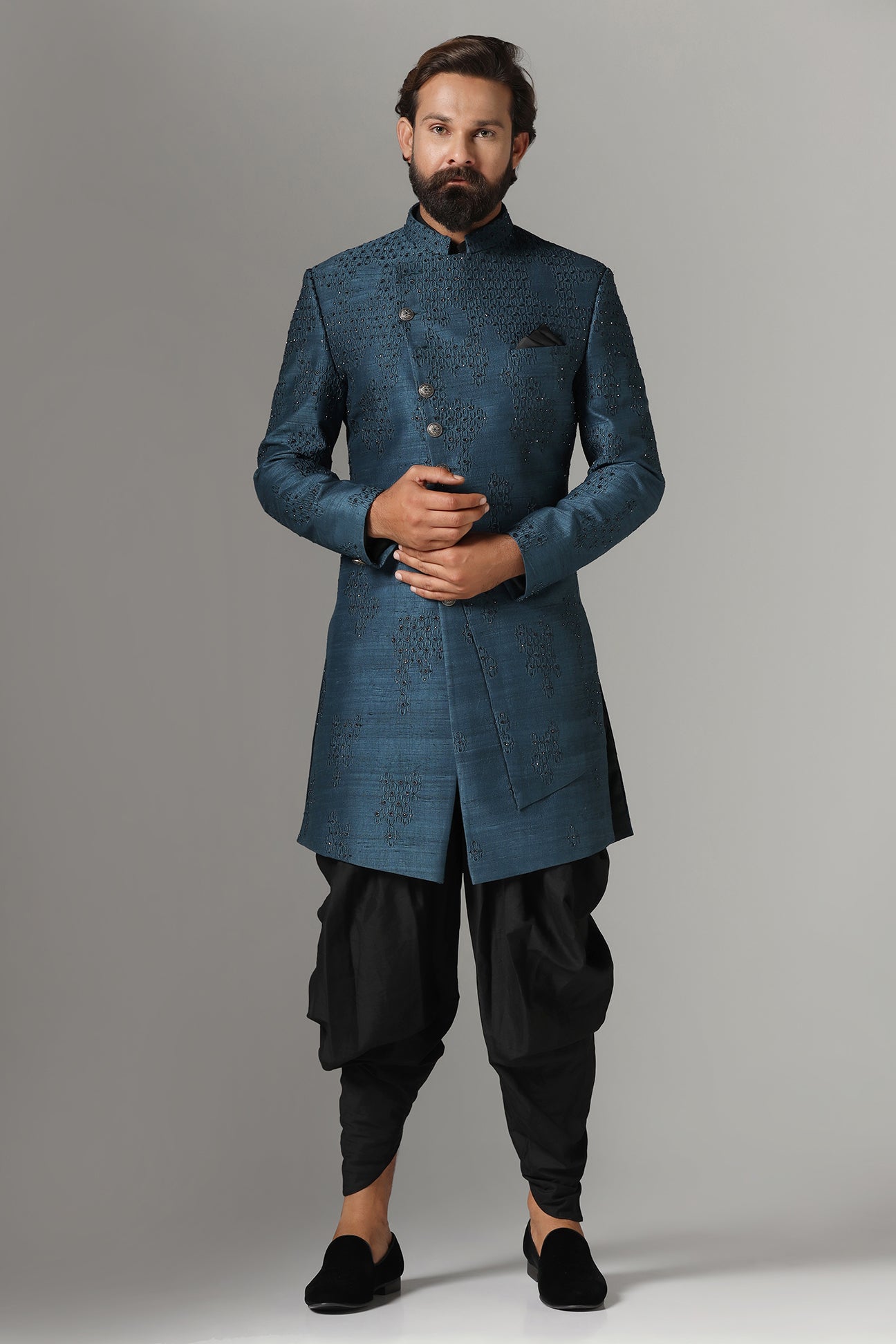 This Blue Indowestern is highlighted with tonal embroidery all across the garment. Shop Now!
